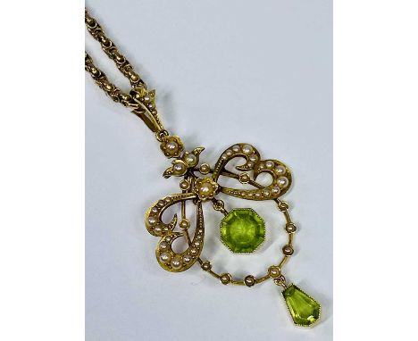 18CT GOLD SEED PEARL DECORATED PENDANT with two peridot drops, one hexagonal framed and the other pear shaped, 6grms, togethe