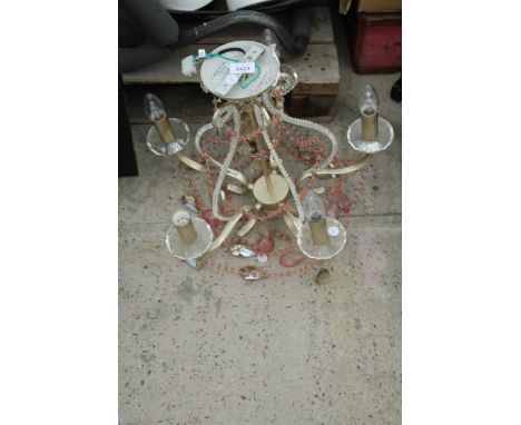 A DECORATIVE CEILING LIGHT FITTING WITH GLASS DROPLETS 