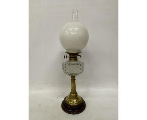A VINTAGE BRASS OIL LAMP WITH GLASS OIL VESSEL, MILK GLASS SHADE AND GLASS FUNNEL