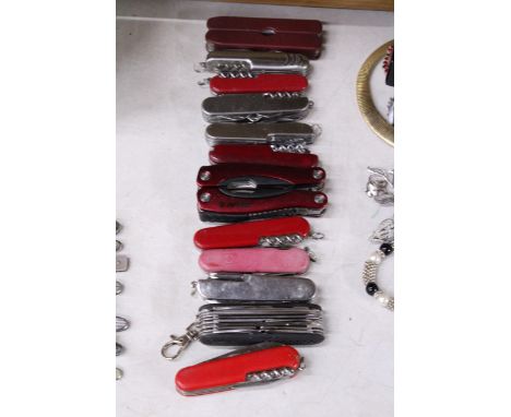 TWELVE MULTI-TOOL KNIVES 