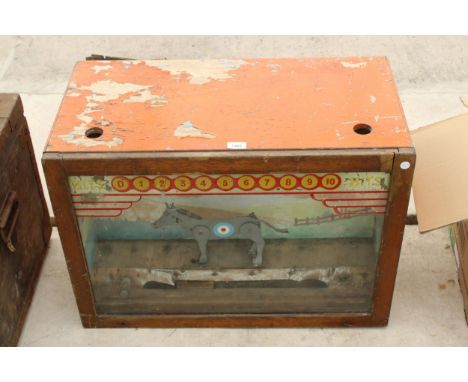 A VINTAGE ARCADE TARGET MACHINE 