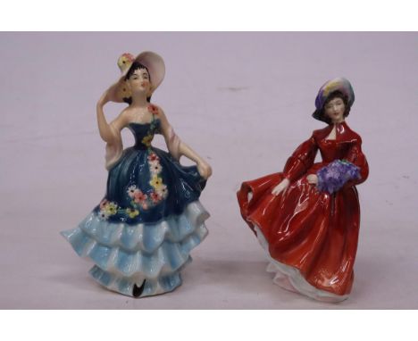 A ROYAL DOULTON FIGURINE "LILAC TIME" HN 2137 TOGETHER WITH A GOEBEL WEST GERMAN FIGURINE