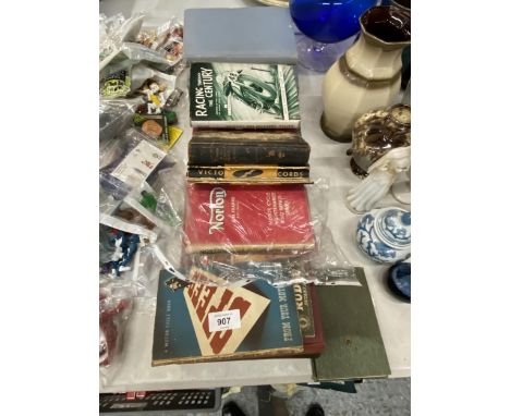 A QUANTITY OF VINTAGE BOOKS TO INCLUDE NOVELS, NORTON MOTORCYCLES, ETC