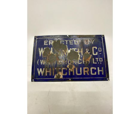 AN ENAMEL SIGN W.H. SMITH WHITCHURCH - 41 X 21.5 CM 