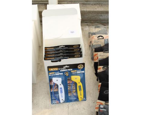 EIGHTEEN NEW AND PACKAGED ACCUSHARP KNIFE AND TOOL SHARPENERS 