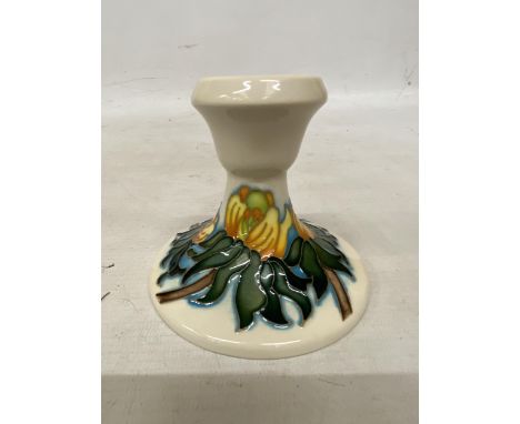 A MOORCROFT CANDLESTICK WINTER ACONITE PATTERN 