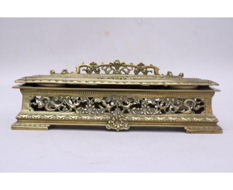 A BRASS INKWELL AND PEN TRAY 