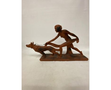 AN ART DECO TERRACOTTA FIGURE OF A LADY AND HOUND 29" X 17" X 6"