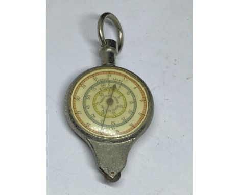 A VINTAGE COMPASS/MILE OMETER 