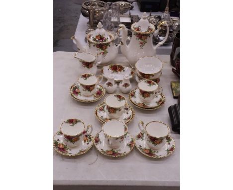 A ROYAL ALBERT OLD COUNTRY ROSES PART TEA SET TO INCLUDE CUPS SAUCERS, SALT AND PEPPER POTS, SUGAR BOWLS, JUG, COFFEE/ TEA PO