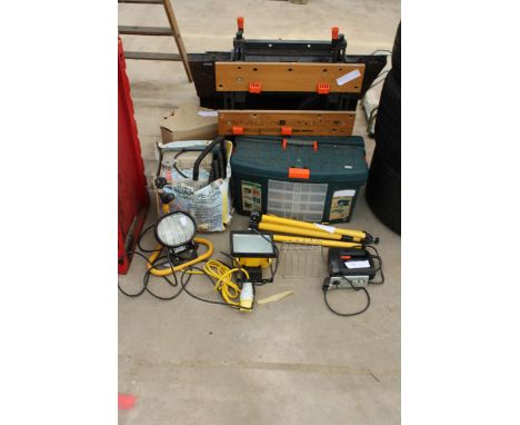 AN ASSORTMENT OF TOOLS TO INCLUDE A FOLDING WORKMATE BENCH, WORK LIGHTS AND A BLACK AND DECKER JIGSAW ETC