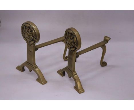 A PAIR OF ART NOUVEAU BRASS FIRE DOGS 