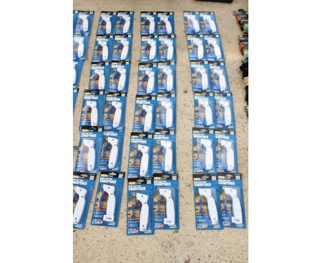 TWELVE AS NEW AND PACKAGED ACCUSHARP KNIFE AND TOOL SHARPENERS 