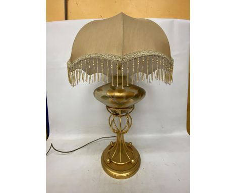 A TALL TABLE LAMP WITH CREAM AND GILDED BASE WITH VINTAGE TASSEL SHADE LAMPSHADE HEIGHT APPROX 80CM 
