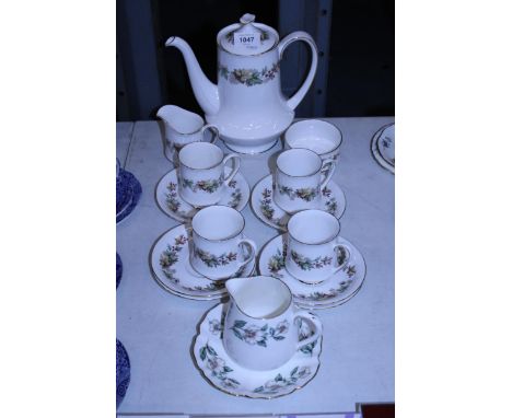 A ROYAL STANDARD COFFEE SET TO INCLUDE A COFFEE POT, CREAM JUG, SUGAR BOWL, CUPS AND SAUCERS