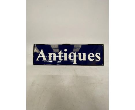 AN ENAMEL ANTIQUES SIGN 51CM X 15CM 
