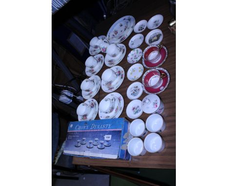A COALPORT TEASET TO INCLUDE PLATES, CUPS, SAUCERS, SIDE PLATES AND A CREAM JUG PLUS TWO ROYAL STAFFORD CUPS AND SAUCERS, PIN