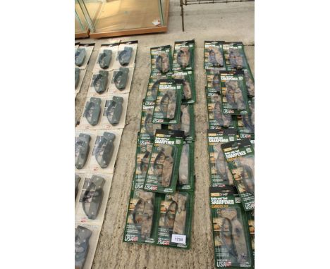 TWELVE AS NEW AND PACKAGED ACCUSHARP KNIFE AND TOOL SHARPENERS 