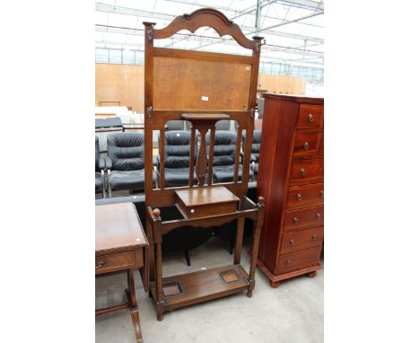 AN EARLY 20TH CENTURY OAK HALL STICK AND COAT HALL STAND WITH MIRRORED BACK, 30.5" WIDE