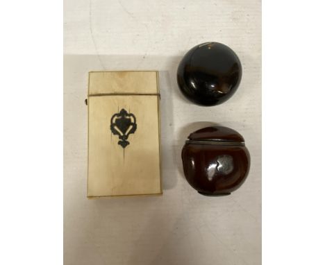 A VINTAGE BEAN NUT VESTA CASE WITH STRIKER TO THE BASE AND POSSIBLE SILVER CARTOUCHE RIM TOGETHER WITH A TORTOISE SHELL STYLE