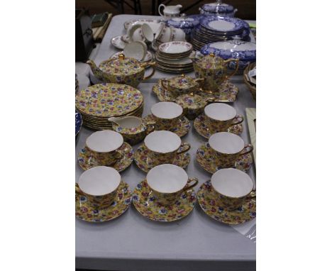 A JAMES SADLER "SOPHIE CHINTZ" TEA SET TO INCLUDE CUPS, PLATES, TEAPOT, JUG ETC