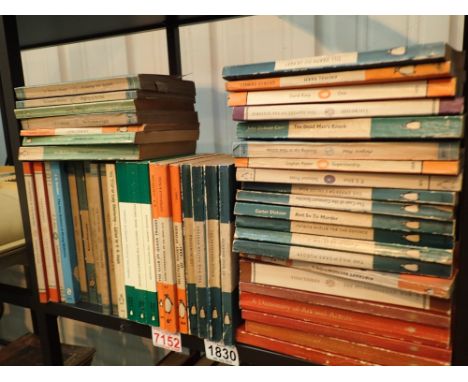 Shelf of vintage Penguin books in good condition 