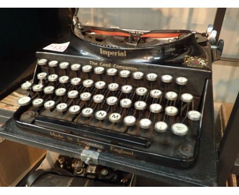 Vintage imperial typewriter with locking case