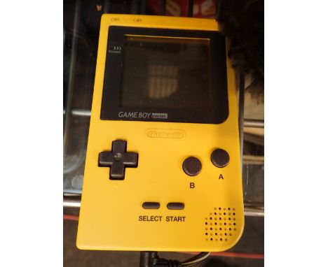 Vintage handheld Gameboy and one game CONDITION REPORT: Game = Arcade Classic Defender Joust