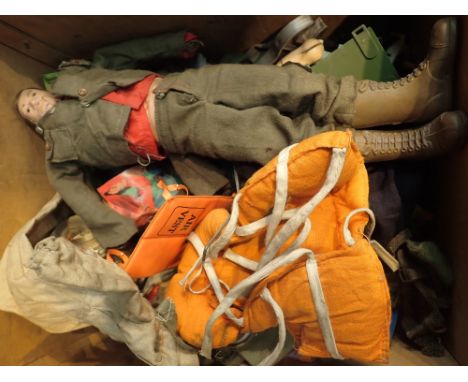 Vintage Action Man model with a box of clothing and accessories 