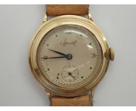 Accurist gents mid size 9ct gold wristwatch on leather strap CONDITION REPORT: This item is working at lotting.