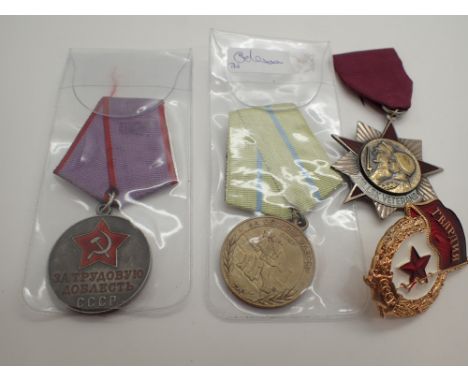 Collection of Russian WWII and veterans medals some in silver enamel 