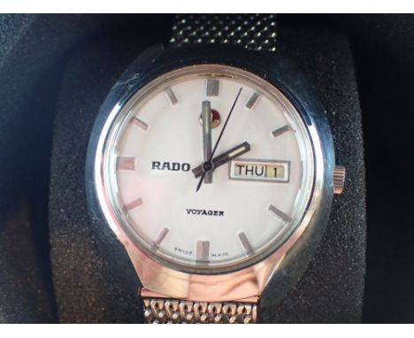 Boxed gents Rado Voyager day date wristwatch CONDITION REPORT: This item is working at lotting. Changes in day date correctly