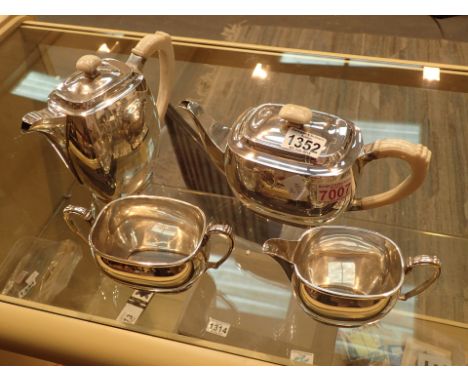 Art Deco silver four piece hallmarked Sheffield 1939 tea set with ivory handles and knobs 1530g maker Fattorini and Sons Ltd 