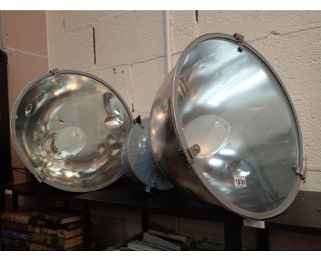 Pair of large industrial light fittings with bulbs