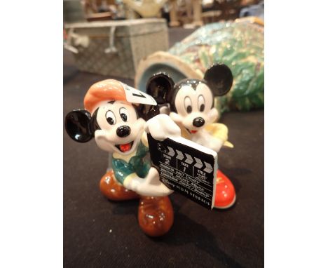Two ceramic Mickey Mouse figurines 