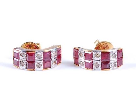 A pair of yellow metal, ruby and diamond two-row half hoop earrings, each featuring four pairs of square cut rubies alternati