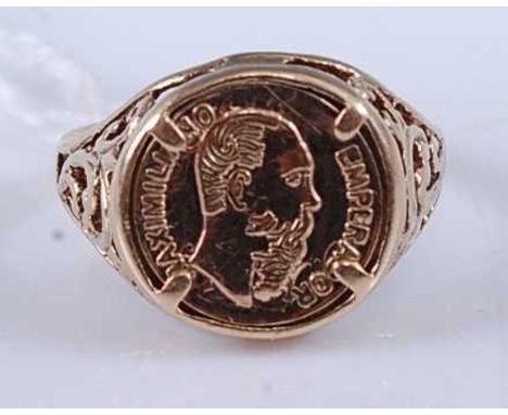 A 9ct gold signet ring, set with a small Mexican 1865 coin, 2g, size k