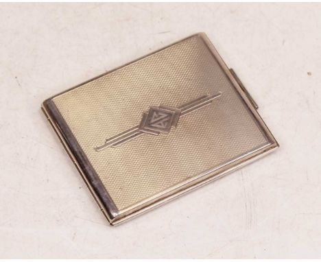 An Art Deco style lady's silver powder compact, of hinged rectangular form with engine turned decoration, 4.1oz 