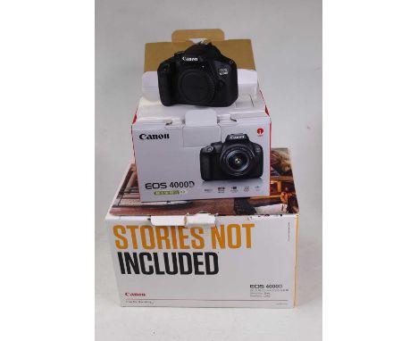 A Canon EOS 4000D digital camera body, boxed with strap bag and manual