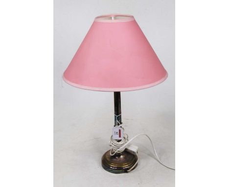 A 20th century silver plate on brass pedestal table lamp, having a pink conical shade, h.47cm 