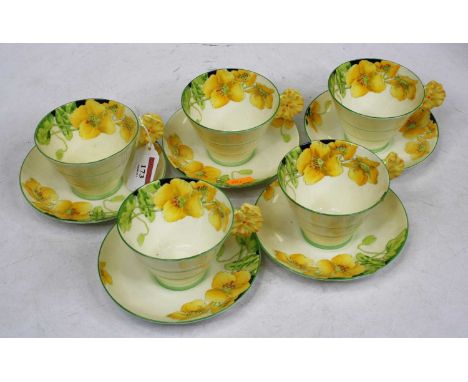 An Art Deco Paragon fine bone china part tea service in the Iceland Poppy pattern No., 8454Condition report: Five cups – one 