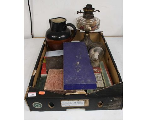 A box of miscellaneous items to include pedestal oil lamp, a Bourne Denby stoneware jug incised GPO with War Department mark,