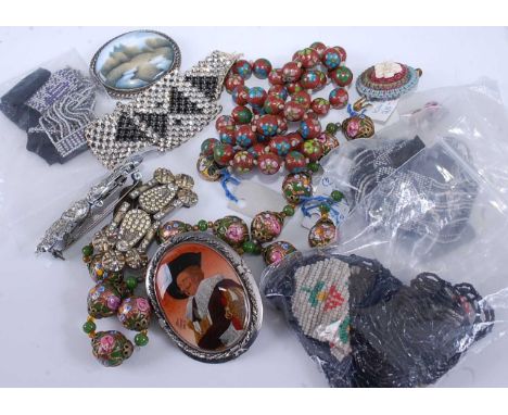 A collection of costume jewellery to include beaded glass necklaces, micro mosaic brooch, porcelain enamel brooch etc