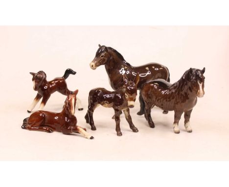 A Beswick figure of a Shetland pony (woolly Shetland mare), model No.1033; together with a Beswick Exmoor pony; Goebel donkey
