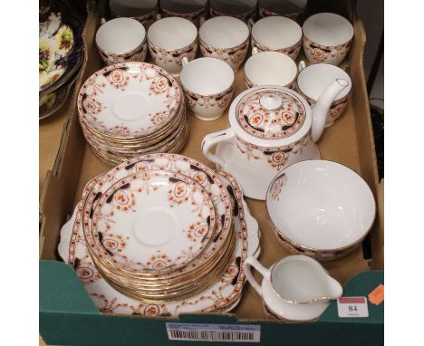 An early 20th century English porcelain tea service, on a white ground with transfer printed floral decoration