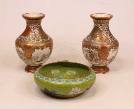 A pair of Japanese Meiji period (1868-1912) satsuma vases, each having a flared rim to squat circular body, the four panels d