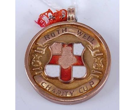 A 9ct gold and enamel set sporting medal for the Rothwell Charity cup 5.4g, dia. 24mm