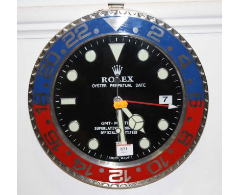 A reproduction brushed aluminium wall clock in the form of a Rolex GMT Master Oyster Perpetual watch dial, dia.34cmCondition 