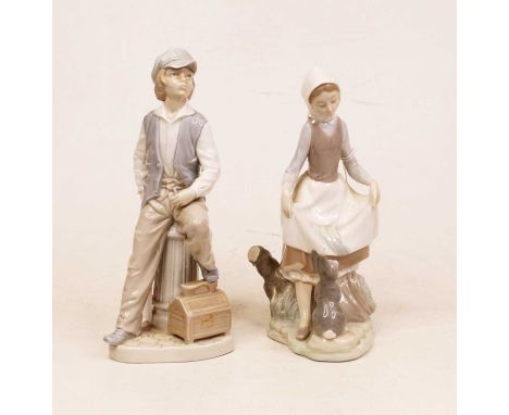 A Lladro Spanish porcelain figure, modelled as a young girl with a rabbit at her feet, printed mark verso, impressed 4876(?),