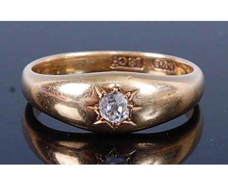 A yellow metal diamond solitaire ring, comprising an Old European cut diamond in a gypsy setting, diamond dimensions approx 3